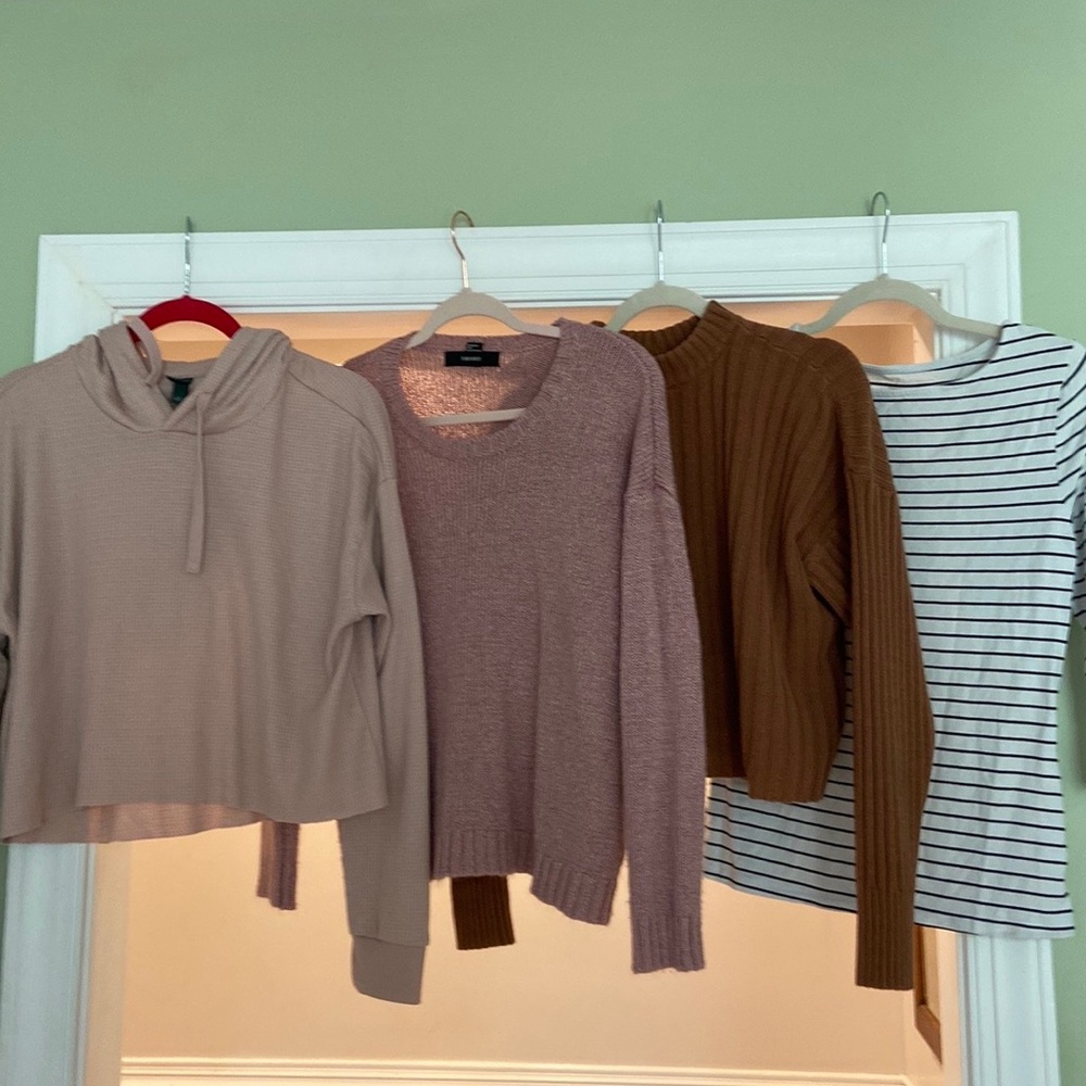 Three. Sweaters one long sleeve top.